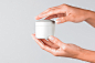 006 holding hand container packaging pot cream cosmetic brand graphic design psd mockup pixeden