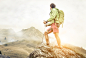 hiker climbing on the mountains. he stays on the top of a rock and watch his goal by Cristian Negroni on 500px