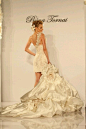 Long-short wedding gown. I'd wear something similar, short in front and long behind :)
