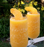 Frozen peach bellini: Blend: 6 oz champagne, 1 oz peach schnapps, 1 can frozen Bacardi peach daiquiri mix and ice.