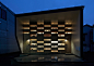 Takeshi Shikauchi creates chequered facade for Tokyo house : Rectangular panels of Japanese cedar and glass create a chequerboard effect on the facade of this Tokyo residence