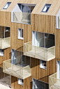 34 social-housing units in Bondy, Bondy, 2010, wooden wall and roof, gray windows: 