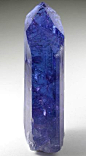 Tanzanite or Zoisite......dissipates negative energies....a detoxifier that helps to neutralise acid causing inflammation of the body....
