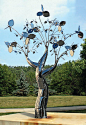 Evolution of Flora Collection, a Stillman Stainless Steel Kinetic Wind Sculpture: 