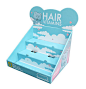 This cardboard countertop display for SugarBearHair features tiered shelves, custom print on the exterior and interior of the display, and a header with a unique cut.