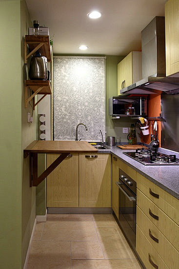 L型的厨房设计让厨房的空间更加实用，防滑...
