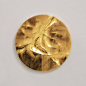 Gold leaf on wood sculptures (2013) by Simon Allen