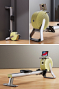 This may contain: there is a yellow and white machine on the table with it's legs up