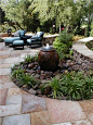 Wonderful patio garden with bubbling water fountain. #gardenchat