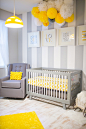 Light – Ikea, grouping of different tissue balls and poms above the crib, gray and white striped walls, color and theme matched DIY wall art, and all the color coordinating accessories adorning the shelves (although when bébé begins to crawl many of them