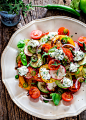 Summer Salad with Herbed Ricotta and Balsamic Vinaigrette - a simple salad with gorgeous heirloom tomatoes, cucumbers and radishes and drizzled with a simple balsamic vinaigrette and a dollop of herbed ricotta takes this salad over the top!