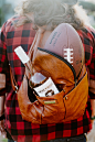 brown leather bag with white plastic fork