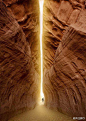 Tunnel of Light - Petra, Jordan. 约旦南部沙漠中的神秘古城。岩石中的微红色调，在阳光下闪闪发亮，每当天阳升起落下，依山雕凿的宫殿便成了“玫瑰红城”。