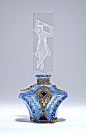 1920s Czechoslovakian perfume bottle, blue crystal, clear intaglio stopper, enameled jeweled gilt metalwork. Made in Czechoslovakia in oval, and on metal. 6 3/8 in.