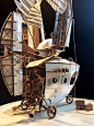 steampunk, dieselpunk miniature model airship, aircraft made by jeroen van Kesteren from cardboard aluminium foil and tracingpaper