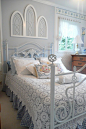 欧式卧室装修效果图大全2012图片 卧室床头半圆形造型背景墙装饰图片 