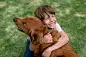 Happy boy with a beautiful dog
