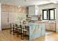 Example of a transitional kitchen design in Denver