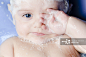Baby in the bath, full of bubbles