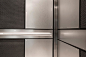 LEVELe-101 Elevator Interior with main panels in Stainless Steel with Sandstone 