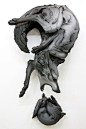 Wolf and rabbit sculpture (by Beth Cavener Stichter)