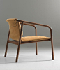 Oslo chair by Angell Wyller Aarseth for Bernhardt Design. Manufactured in North Carolina, the walnut frame with a sling back and seat mar...