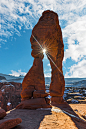 mistymorningme:

Sunstar and Delicate Arch © Guy Schmickle
Got time for another quick post of Delicate Arch before I head down to Fountain Hills for the massive art show they put on. This angle is a bit different from most you see of this beautiful arch a