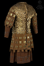 Comedy-French N °:  D-CF-739 B ROLE:  Peer Knight COSTUME DESCRIPTION:  Skin armor doublet lined with metal plates and copper scales on a tunic and skirt in brown wool. BACK