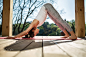 Girl in downward facing dog pose by Andrey Bezuglov on 500px