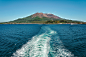 breathtaking-shot-mountainous-landscape-surrounded-by-ocean