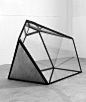 Glass and metal geometric sculpture