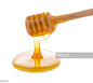 Close-Up Of Honey With Dipper On White Background : 圖庫照片