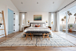 Bedroom - coastal master light wood floor and wall paneling bedroom idea in Los Angeles with white walls and no fireplace