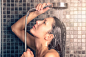 Young woman washing her long hair under the shower by Lars Zahner on 500px