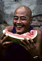 faith-in-humanity:  Population in China by United Nations Photo on Flickr. A local man enjoys a watermelon in Sichuan Province, China. About...