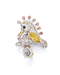 Fancy Intense Orangy Yellow Diamond and Diamond Ring. Designed as a seahorse and starfish, set with a marquise-shaped fancy intense orangy yellow diamond weighing 0.64 carat, decorated with circular-cut diamonds, black diamonds and diamonds of yellow and 