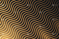 Abstract black background with golden waves. Linea