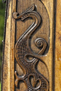 Wood carving of a dragon on a Viking boat Stock Photo