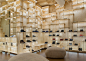 Kengo Kuma adds timber grid to Milan Camper store : Japanese architect Kengo Kuma has covered the interior of Camper’s Milan store in a grid of pale ply that stretches from floor to ceiling.