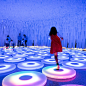 LIKEarchitects forms indoor exhibition space with 20,000 fabric strips : under the skylight at lisbon's colombo shopping mall, LIKEarchitects have constructed a temporary exhibition space to hold artist jen lewin's interactive and luminous installation, '
