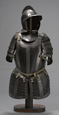 A German black and white half-suit of armor  late 16th/early 17th century