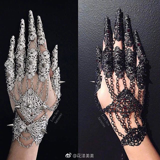 设计师Lory Sun制作的金属手套，看...