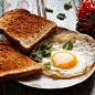 a fried egg with bread