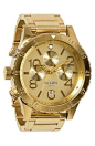 Dazzling, gold Nixon watch.