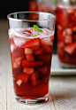 Red wine, diced strawberries, Sprite and ice