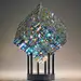 Glass Sculpture by Fine Art Glass Artist Jack Storms Cold glass artist Jack Storms takes this universally approachable form, the cube, to the next level. The Magik Chroma Cube features a very intricate triple cut core making it a cube sculpture like nothi