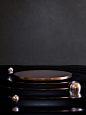Round gold pedestal on black background Premium Photo