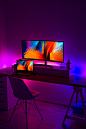 turned on flat screen monitor and black laptop computer on table