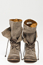 I want these boots! I can't see the tag to get the name : (  the link is to dsw I think. Maybe Santa will bring them.