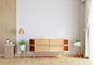 Wood sideboard in living room interior with copy space Free Photo
